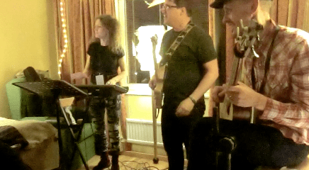 Playing Tom Waits "Way Down In The Hole" in a hotel room at Folk@Heart Festival 2014, Örebro, Sweden